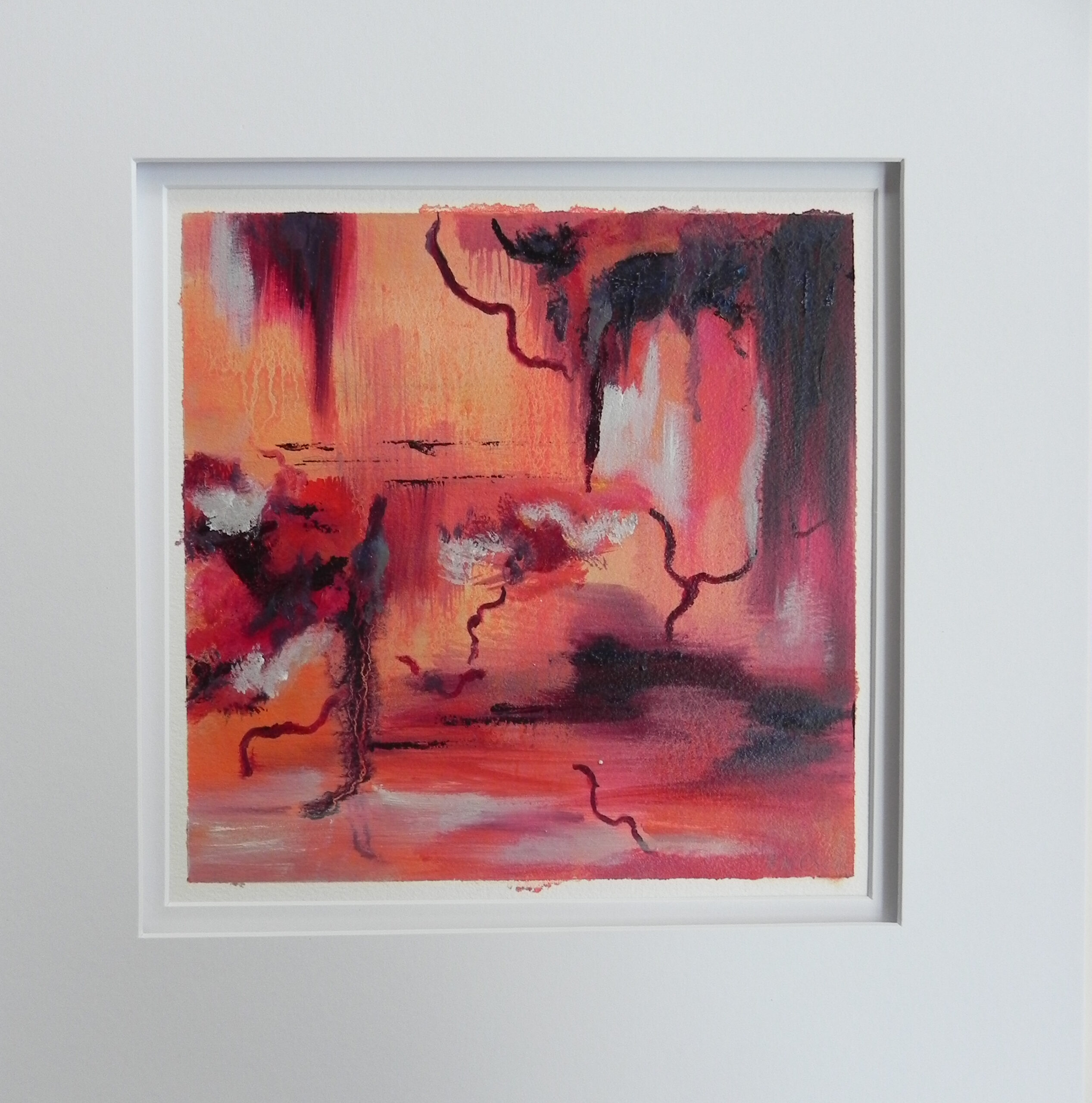 Abstract landscape painting with red orange and black tones in white frame
