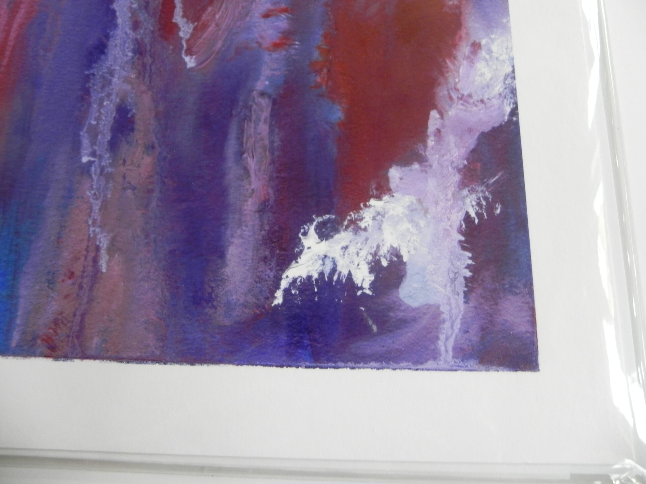 Abstract art print with purple, red, and white brushstrokes in a white frame