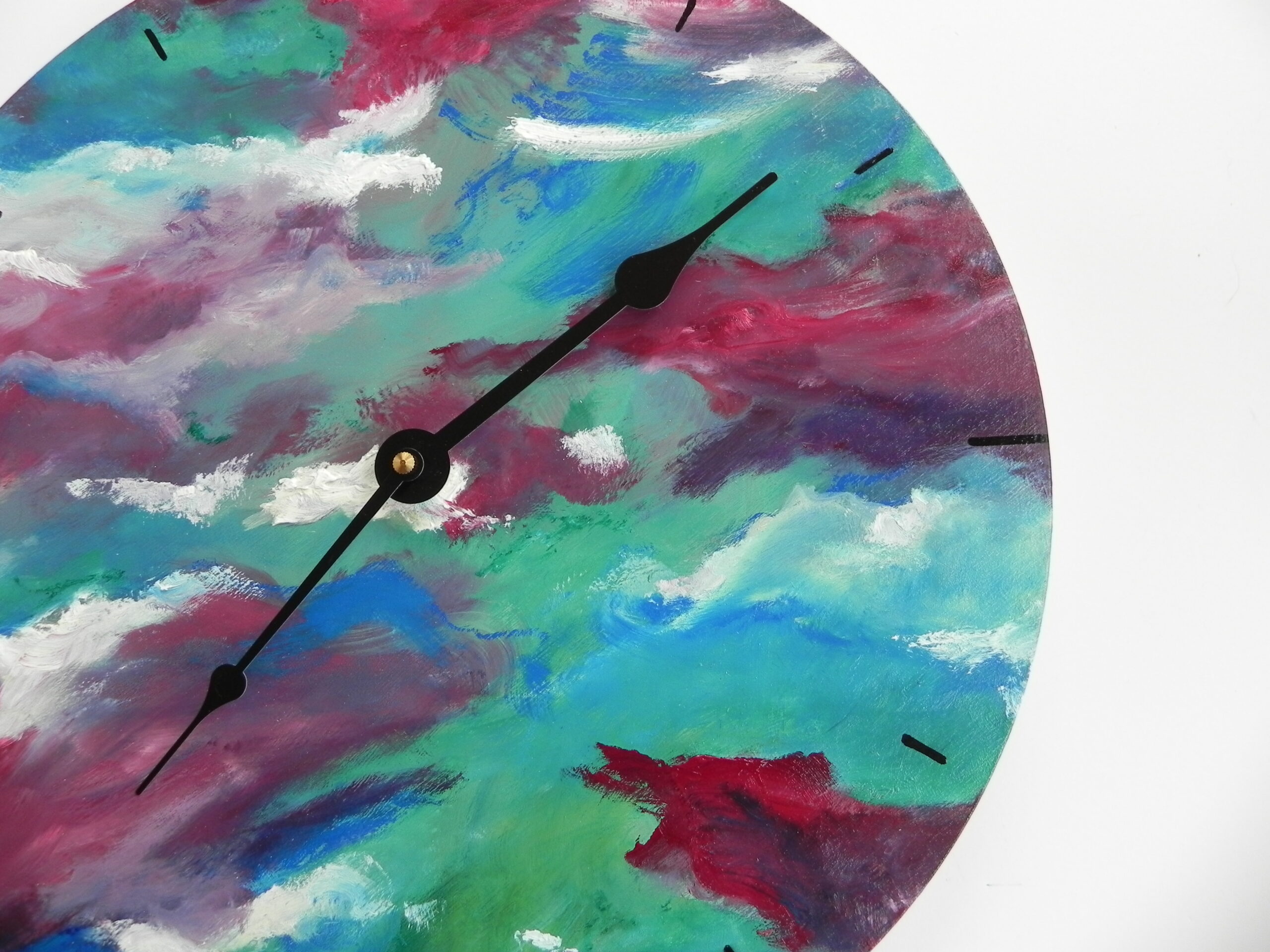 Abstract painted wall clock with teal, pink, and purple swirls and black hands