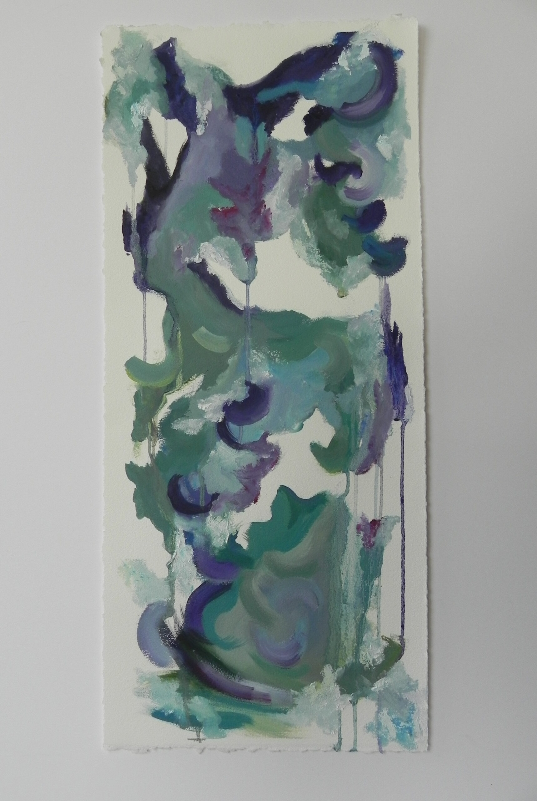 Abstract vertical painting with green and purple brushstrokes on white paper