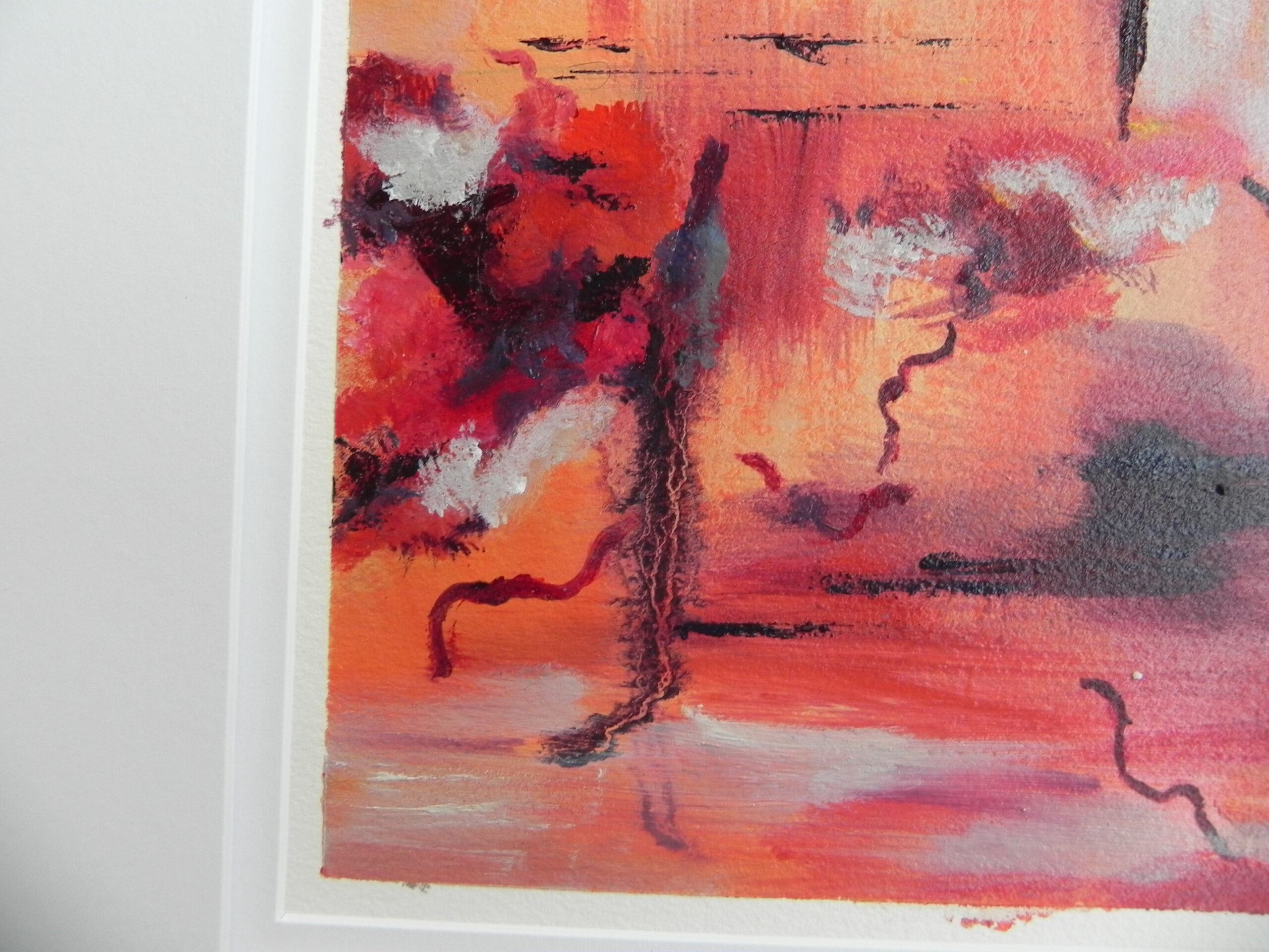 Abstract art print featuring warm orange, red, and black brushstrokes with white accents on textured paper.