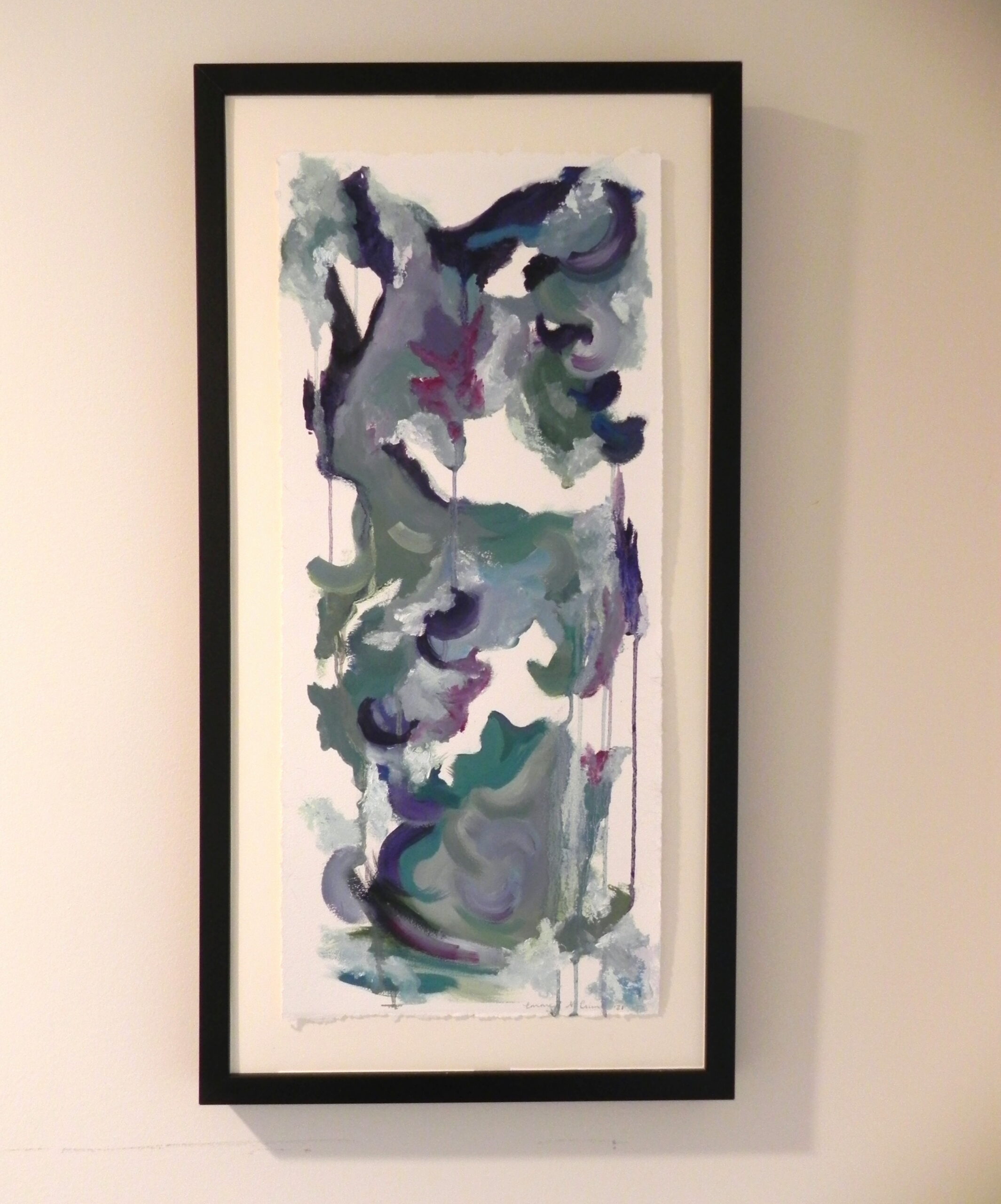 Framed abstract painting with blue, purple, and green brushstrokes on white background