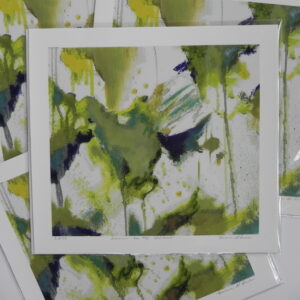 Abstract art print with green, yellow, and blue watercolor splatters on white paper