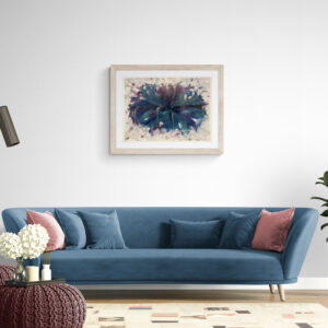 Abstract floral painting in a light-colored frame hanging above a blue sofa with pink pillows.
