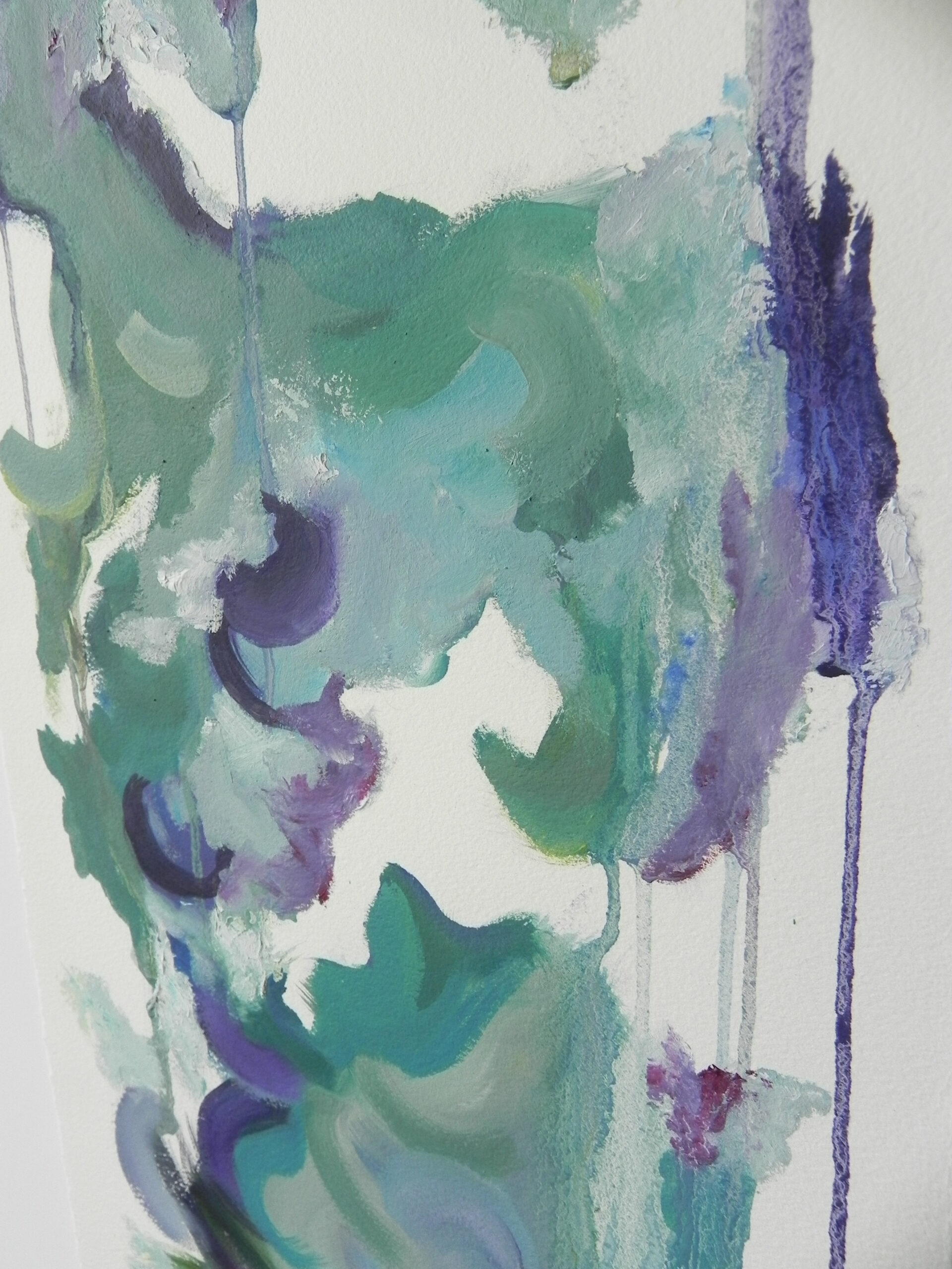 Abstract painting with green, blue, and purple brushstrokes on white paper